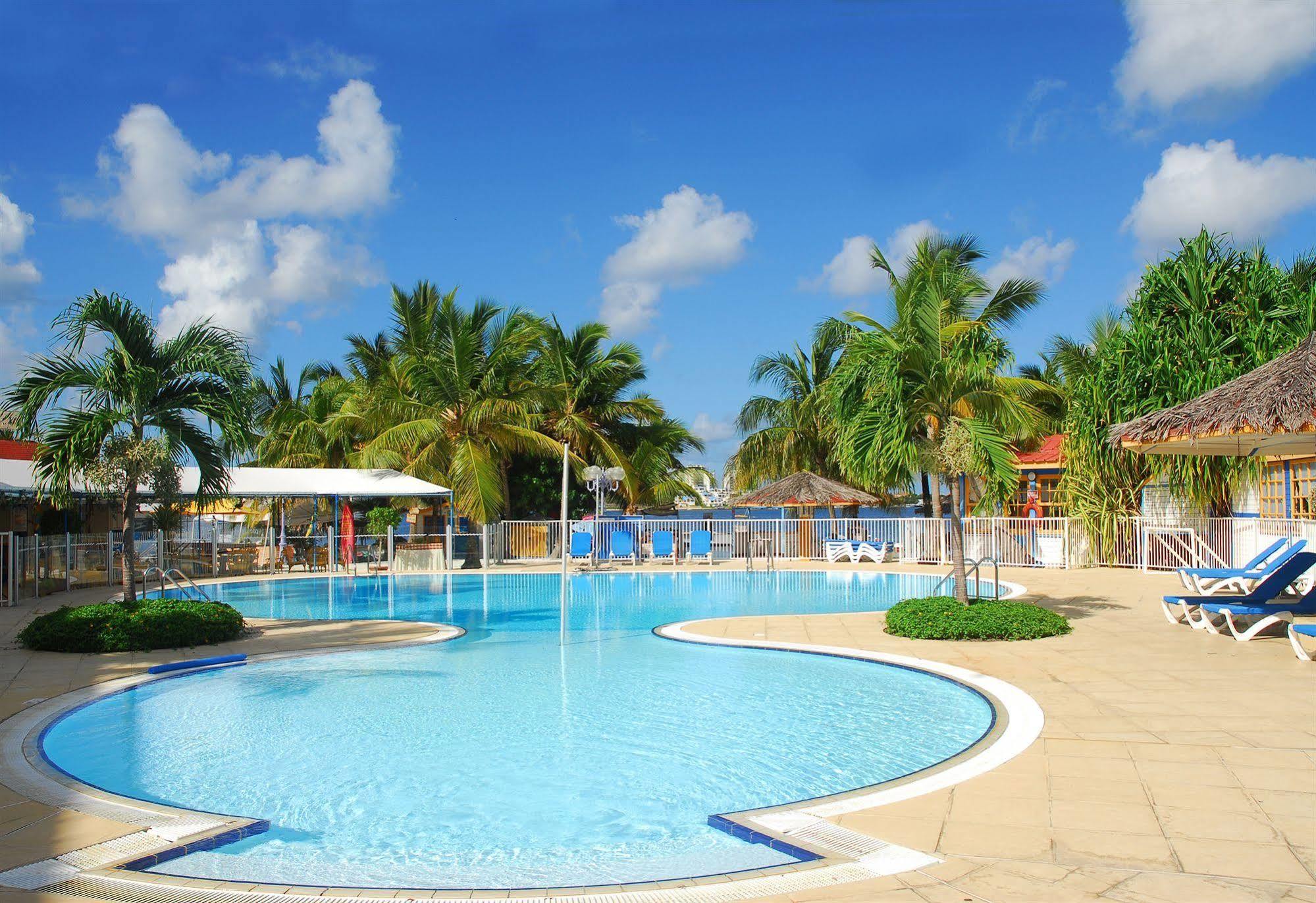 Le Flamboyant- Le Village Baie Nettle Bagian luar foto